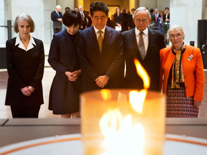Abe and wife Akie at the U.S. Holocaust Memorial Museum with Holocaust survivors