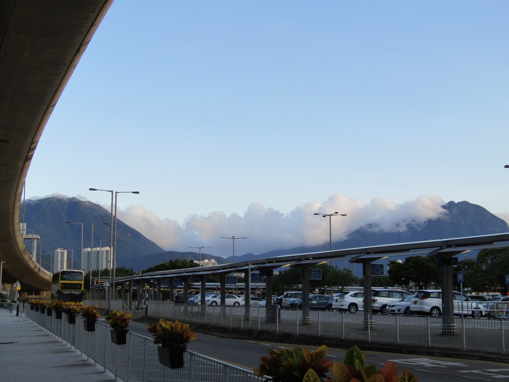 The view of the clouds rolling in over the mountains at Hong Kong International Airport made up for the fiasco of catching a bus to the city (honestly, who has exact change when they leave the airport?).