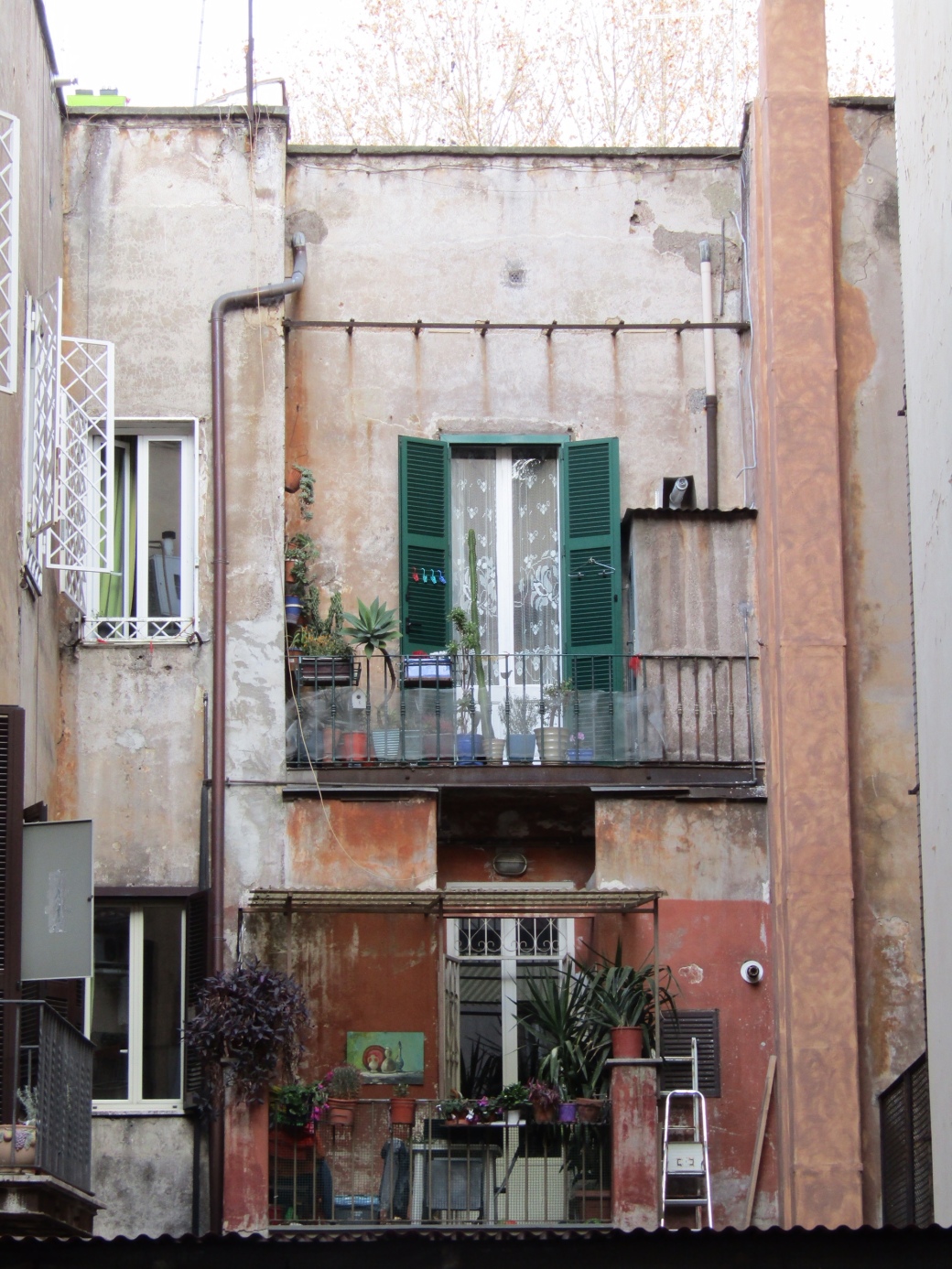 A typical Rome apartment building. The disrepair of the outside is quite beautiful, fitting into the rustic look that dominates this ancient city.