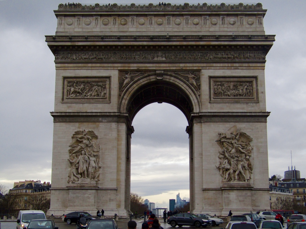 Photos of the Arc de Triomphe are always tightly cropped because it sits in one of Paris's busiest intersections. All our photos are filled with cars and white delivery vans!
