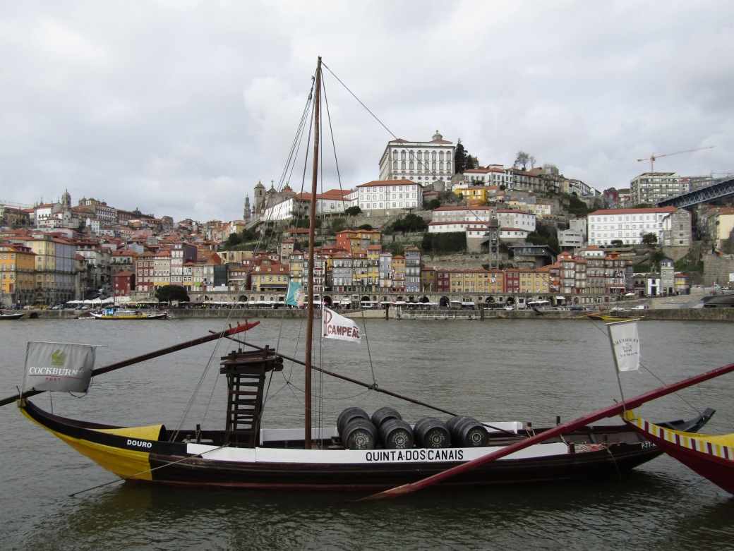A Rabelo boat belonging to Cockburn's Port House sits in the Douro River.